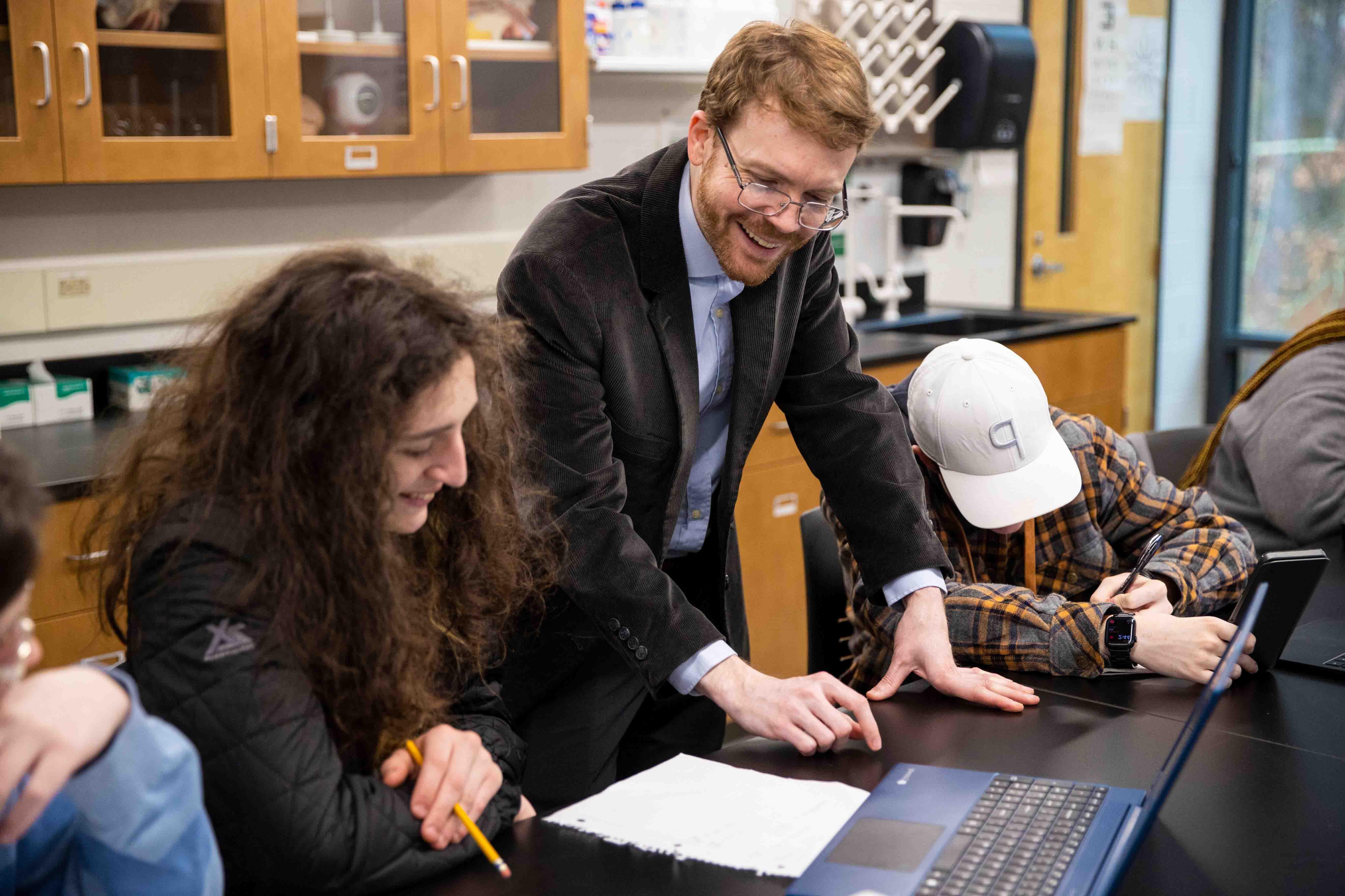 A professor working with a student